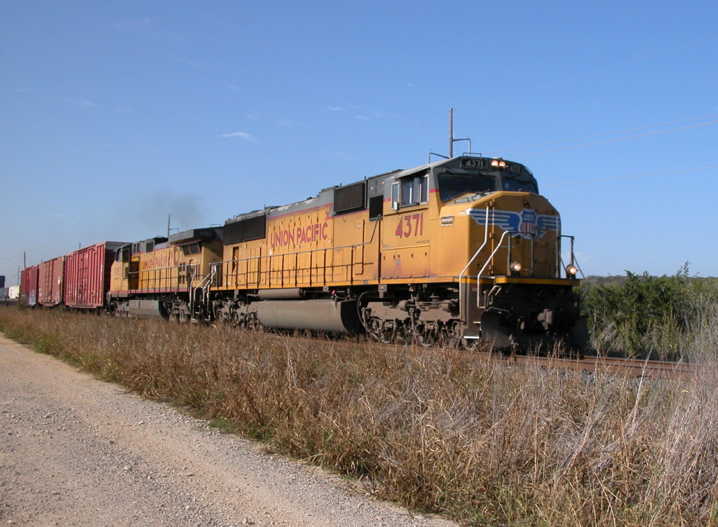 UP 4371  24Nov2011  NB at JAMA with mixed merchandise 